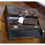 A Victorian coromandel lady's writing companion, with turned handle, double hinged cover and drawer