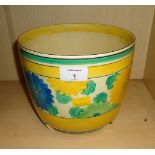A Clarice Cliff Bizarre Sungay pattern jardiniere of cylindrical form, on three moulded feet,
