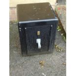 A small fireproof safe, with key