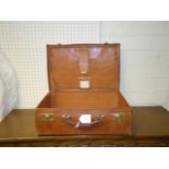 A vintage pig skin vanity case, with fitted interior