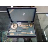 A circa 1930s cased ivory manicure set, decorated with zebra