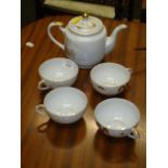 A Japanese lithophane bottomed porcelain eggshell tea set