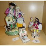 A 20th century continental porcelain figure group, two 19th century German porcelain figures and a