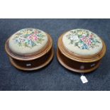 A pair of 19th century oak footstool spittoons, each with floral woolwork upholstered hinged