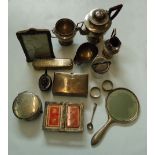 A collection of silver items, including sugar basin, hot water, playing card case and other items,