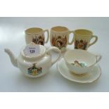 A collection of bone china and pottery royal commemorative wares, including a 1937 mug, pair of 1953