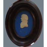 A George III Random and Sneath plaster profile bust miniature of Nelson, 7 x 5cm oval, in a