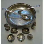 A matched pair of silver George II style trencher salts, two silver bun salts, two peppers, an