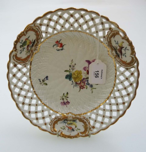 A 19th century late Meissen porcelain ribbon plate, decorated with sprigs and floral sprays within a