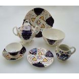 A mid 19th century Gaudy Welsh Tulip pattern tea service, comprising twelve tea cups, eleven