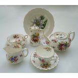 A Royal Worcester Roanoke part tea service, comprising four cups, saucers, tea plates, cake plate,