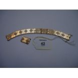 A 9ct gold textured brick link bracelet, (with additional links)