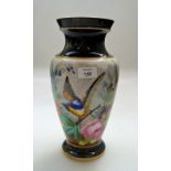 A 19th century Paris porcelain vase, of baluster tapering form, decorated with a songbird, colourful