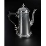 A bachelor coffee pot, tapering cylindrical, with leaf-capped spout and knopped finial to domed,