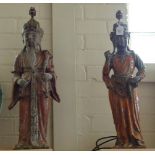 A pair of Chinese style large and impressive terracotta figural table lamps, in the form of an