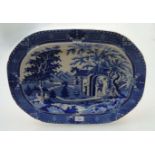 An early 19th century Wood and Brettell blue and white transfer printed oval meat dish, in the '