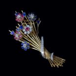 A ruby, sapphire and diamond spray brooch, composed of gem set clusters, and single mixed cut