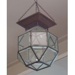 An early 20th century bevelled and leaded glass hanging lantern, of angular knop form, 42cm high