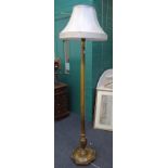 A possibly 1920s Maple & Co gilt chinoiserie decorated standard lamp, with moulded disc base and