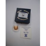 A 1987 proof half sovereign, numbered 02052, cased, with certificate of authenticity