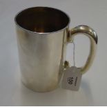 William Hutton and Sons Ltd, a plain silver tankard with elongated loop handle, London 1904, 12cm