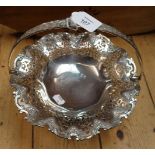 Thomas Levesley, a silver bread basket, the acanthus cast swing handle over a scrolled and pierced