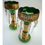 A pair of 20th century enamel and gilt green glass table lustres, with hanging drops, 31cm high