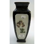 A late 19th century Japanese square section vase, of tapering form, the panelled sides decorated