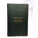 A Soviet Era World War atlas with may coloured fold-out maps, in embossed and gilt green oil cloth