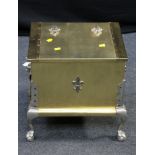 A brass and cast steel coal box, with applied Prince of Wales feathers, twin side handles, on