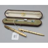 Edward Tessier (Retailers), a cased white onyx and gilt metal dip pen with turquoise bead collars (