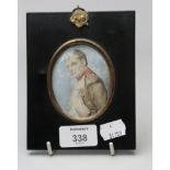 A 19th century half length portrait miniature on ivory of Napoleon after David, ./5 x 6cm oval, in