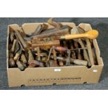 A collection of late 19th century/early 20th century cabinet maker's tools, including jack, moulding