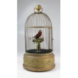 A large late 19th/early 20th century French singing bird automaton in a gilded metal cage,