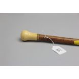 An early 19th century malacca dandy cane with ivory knop handle, 87cm