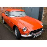 MGB 1.8 convertible with hard top, finished in orange, speedometer indicates a mileage of 38,572,