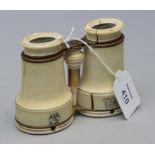 Ringard, Paris, a pair of early 20th century ivory mounted opera glasses, 11cm (open)