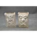 Two embossed silver matchbox holders, London 1895 and Birmingham 1898 - approx total weight 91g/2.