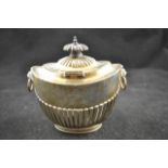 A Georgian style half fluted tea caddy of oval form, maker Sheffield 1901, James Deakin & Sons -