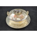 A silver butter dish, engraved foliate decoration, cow surmount to lid, frosted glass liner,