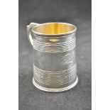 A ribbed silver christening tankard, monogrammed, London 1864 - approx weight 134g/4.3 troy oz