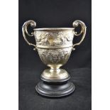 A two handled embossed silver trophy inscribed 31st Thames Sailing Barge Match, decorated with