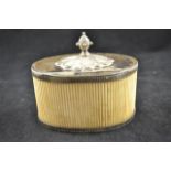 A 19th century ribbed ivory tea caddy with silver plated mounts, lid surmounted by a pineapple