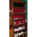 A six-section mahogany Globe Wernicke style bookcase with reeded side columns