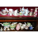 A large quantity of assorted ceramicwares (all the contents of the lower two shelves)