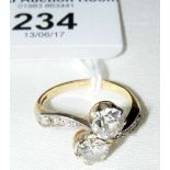 A fine quality two stone diamond cross-over ring - approximately 2 carat total - in gold setting
