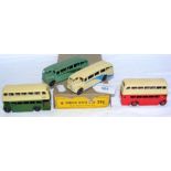 Two double deck and two single deck Dinky Toys buses