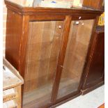 A glazed antique bookcase