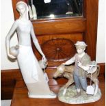 A Lladro figure of boy with calf, together with a Lladro style figure of lady