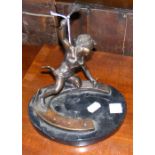 Bronze figure of child hammering nail on marble plinth